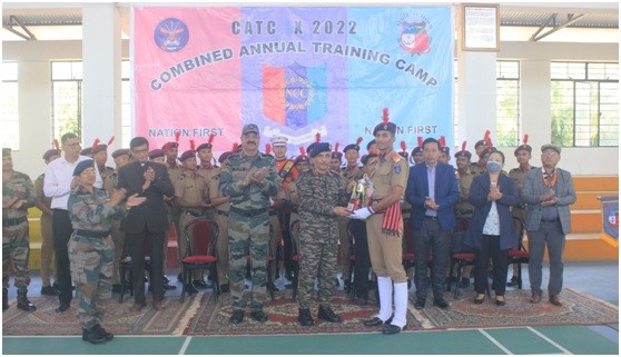 Maj Gen Sumit Talwar Chairman LBA awarding best cadet trophy.